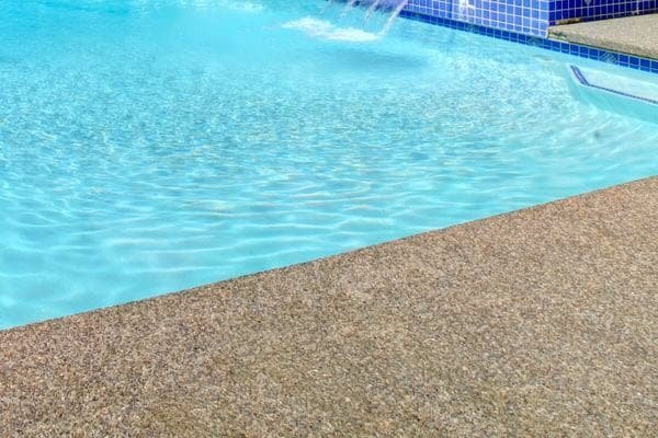 Less puddling at garage doors and side gates with porous paving - Permeable Paving Adelaide